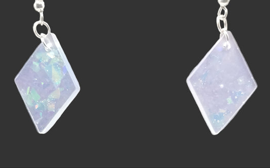 Diamond-shaped earrings with a reflective surface, opal on a gray background