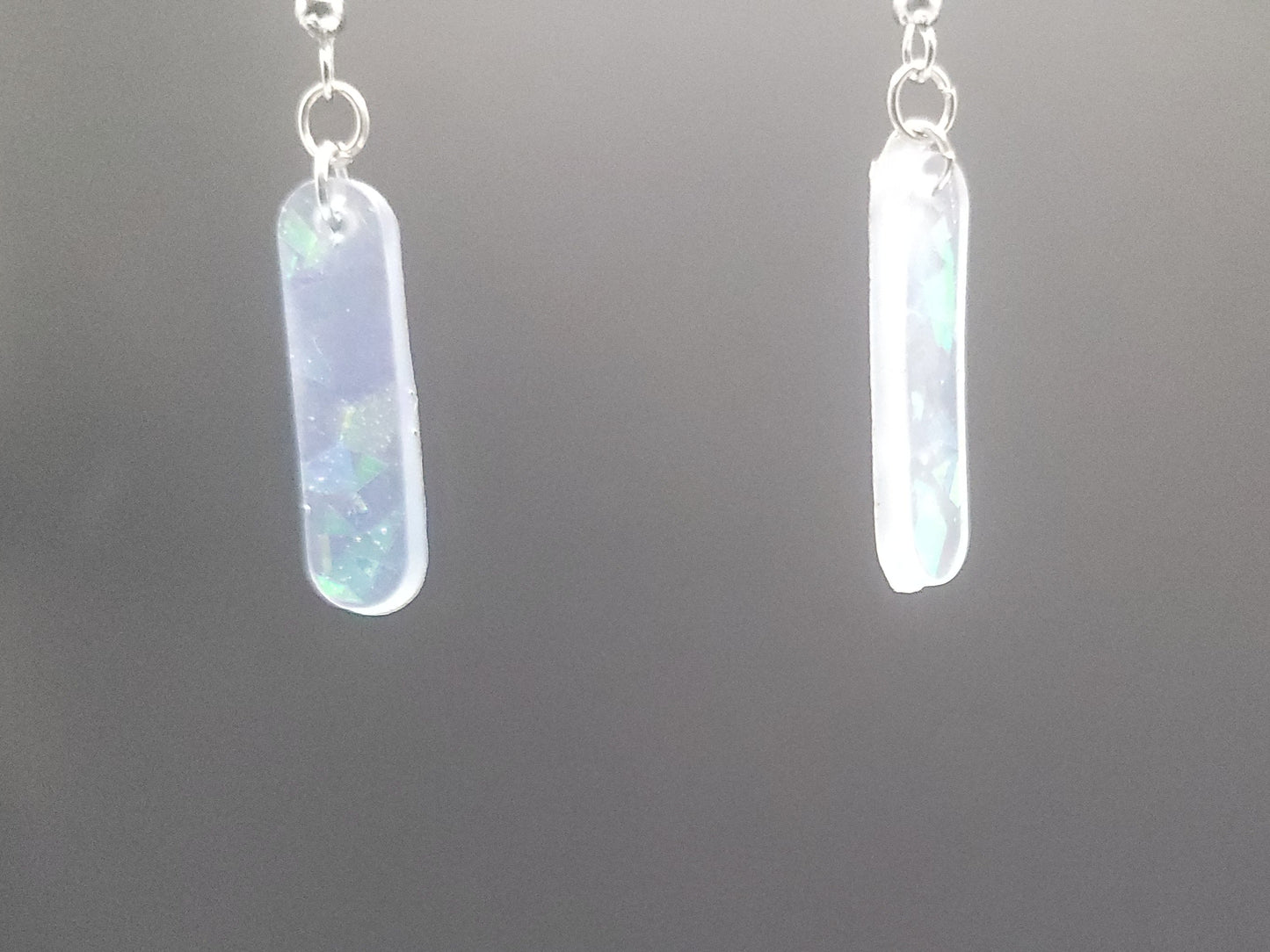 Opalite bar earrings on a gray background