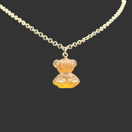 Teddy bear charm on a delicate gold chain