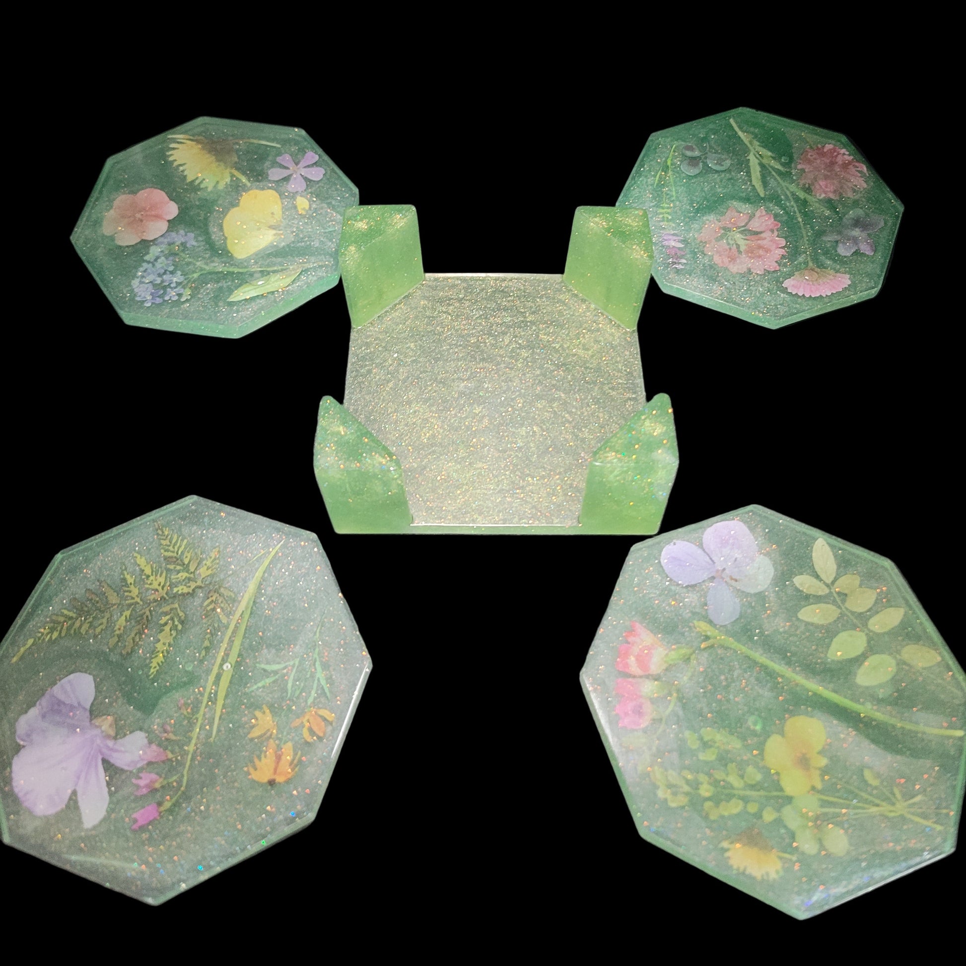 Decorative green floral themed beverage coasters with patterns