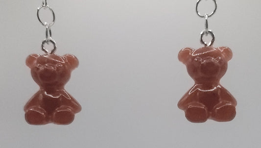 Brown teddy bear earrings on a white background