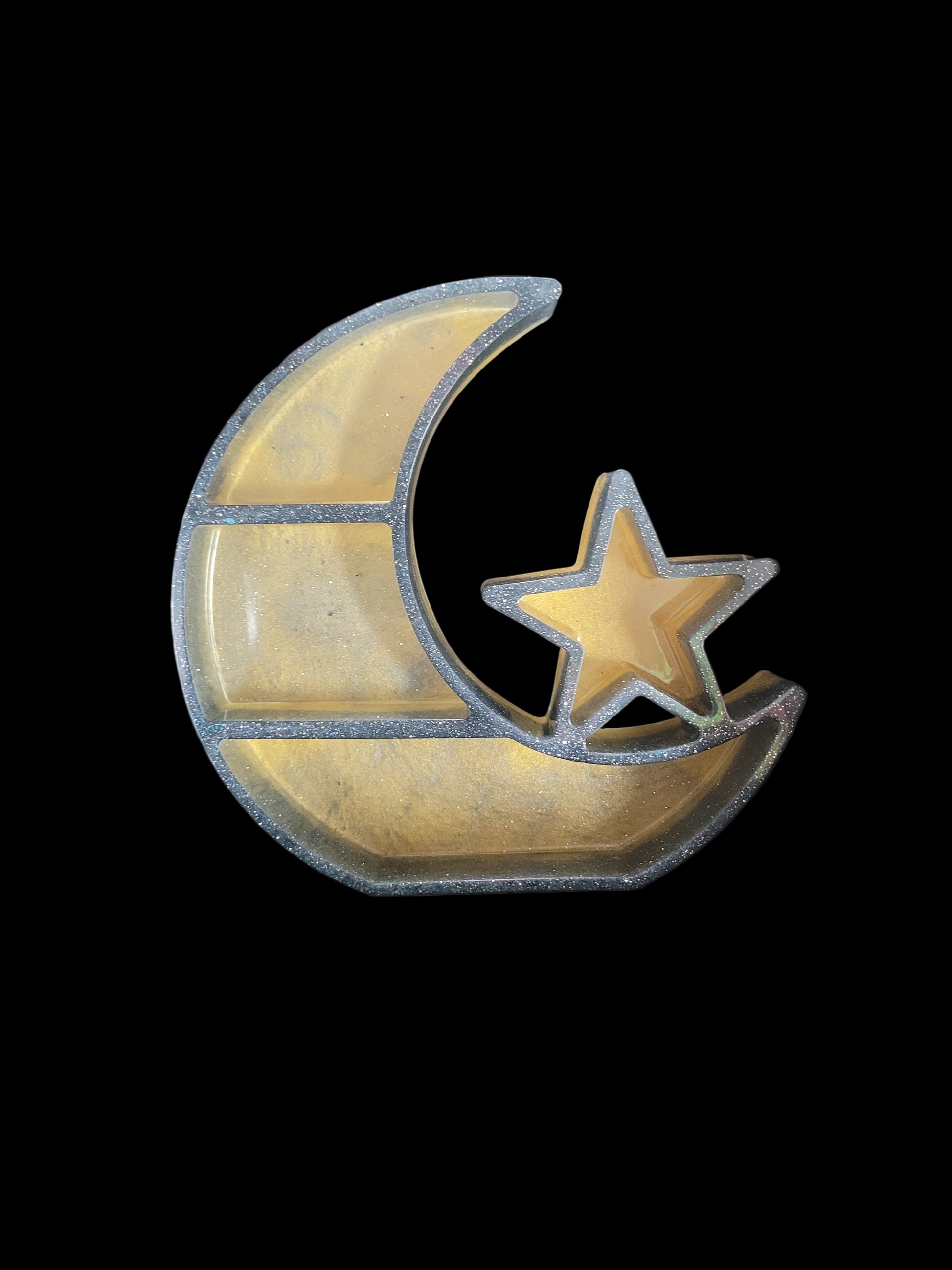 Decorative resin shelf with a moon and star design. Wall mountable or stand alone